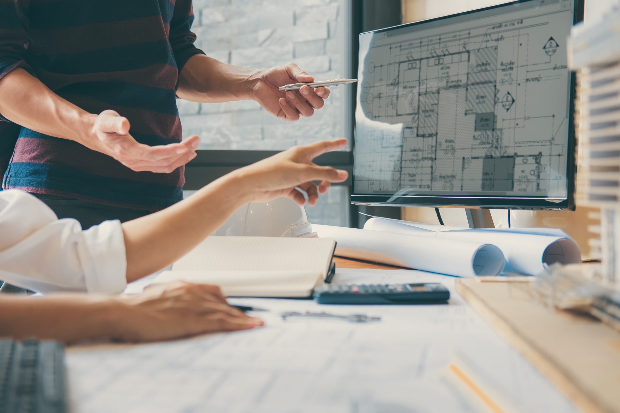 Image of engineer or architect partner meeting for working with